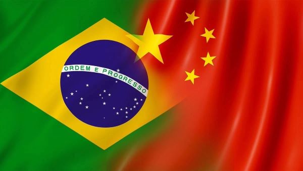 США в шоке: КНР и Бразилия переходят на расчеты в национальной валюте